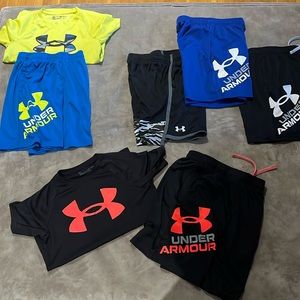 2 Under Armour Shirts-youth medium. 5 Under Armour shorts-youth medium